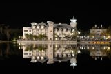 Celebration Hotel at night with reflection on water